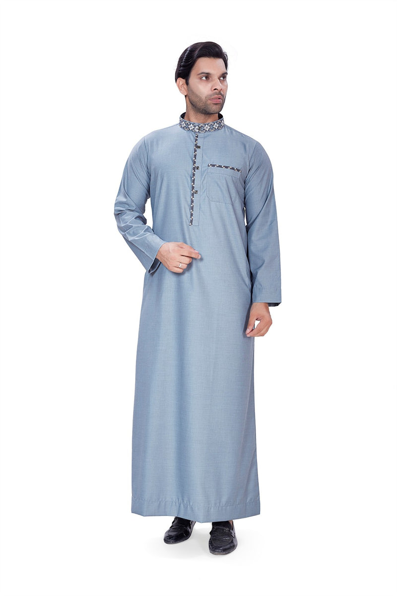 Blue long-sleeved thobe with patterned embroidery on the collar and placket By Zamzam