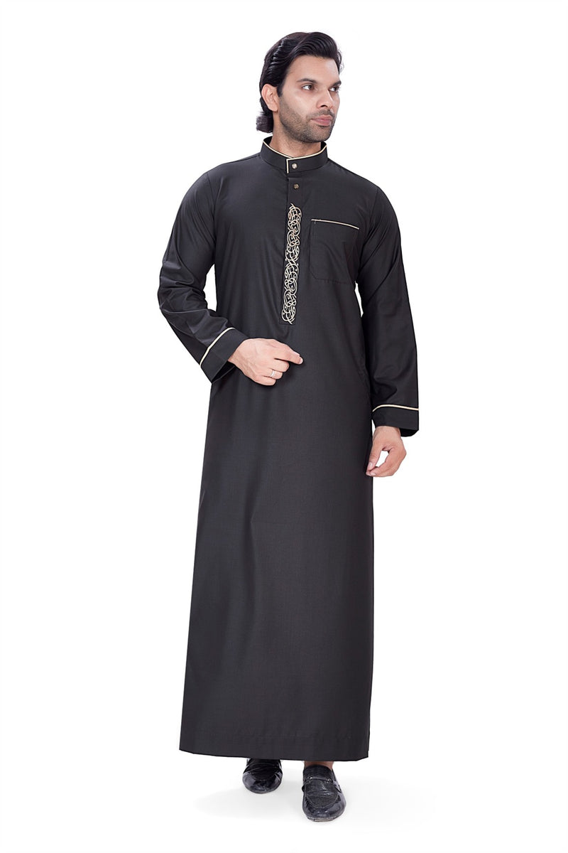 Black thobe or kaftan robe featuring gold embroidery along the stand-up collar and chest By Zamzam