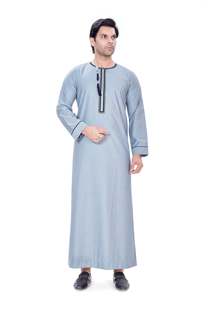 Grey Chenille Boutique  thobe featuring black embroidered placket detailing and cuffs By Zamzam