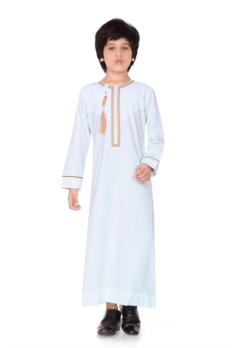 Boy's White Long Sleeve Omani Thobe with contrasting embroidery and a tassel detail By Zamzam