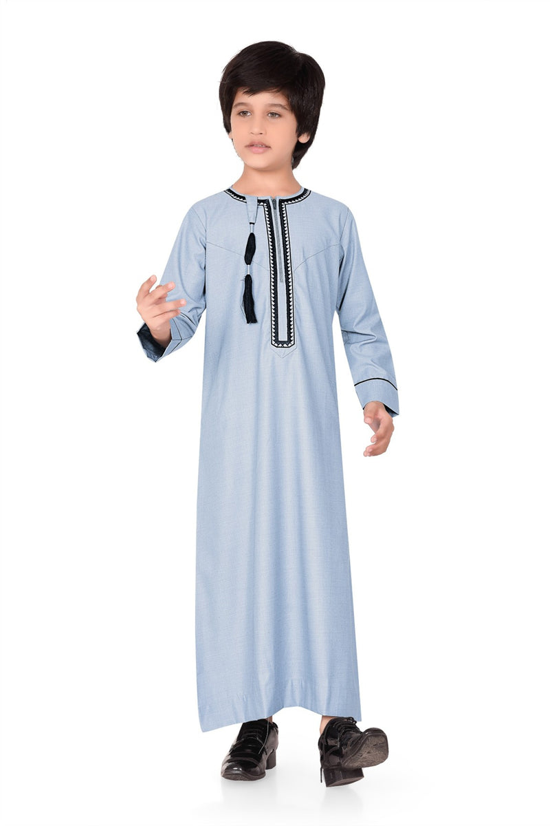 Sky blue boys Omani thobe featuring intricate black embroidery and a detachable tassel By Zamzam
